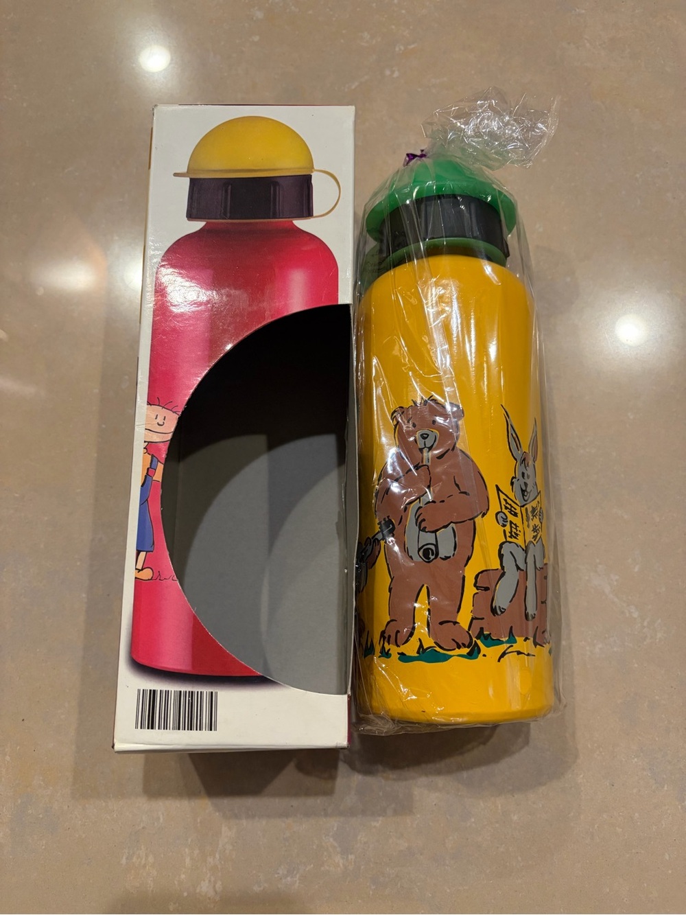 Kids Animal-Print Yellow Water Bottle with Green Cap (German brand)